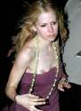 1456401827-avril-lavigne-nipple-slip.jpg
