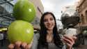 199342-melinda-privopoulos-holds-apples-in-rundle-mall.jpg
