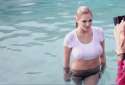 Kate Upton posing for uncle T.gif