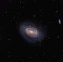 Spiral Galaxy NGC 4725 is unique because it only has one spiral arm.jpg