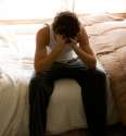 man_sad_bed.jpg