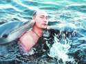 putin with dolphins.jpg