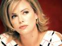 charlize-theron-actress-fashion-model-wallpaper-hd-images-x0h50e.jpg