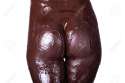 32038155-Naked-female-body-covered-with-dark-chocolate-Stock-Photo.jpg