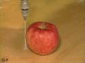 apple being cut with water.gif