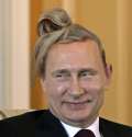 vladimir-putin-man-bun-funny-meme-hair.png