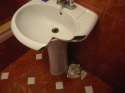 Broken-sink-by-deodorant-can.jpg