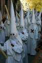 220px-Not_what_you_may_think_-_these_are_nazarenos_(hooded_penitents)_in_the_Holy_Week_parade_in_Granada_(IMG_5519a).jpg