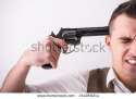 stock-photo-young-man-is-going-to-killing-himself-grey-background-244959214.jpg