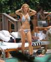 60158_Michelle_Hunziker_Bikini_Candids_poolside_in_Miami_May_2_2012_25_122_563lo.jpg
