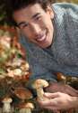 15224563-man-picking-mushrooms.jpg