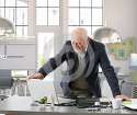 senior-engineer-working-computer-office-architect-standing-desk-35112973.jpg