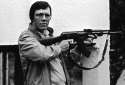peter-robinson-caught-on-camera-in-late-1984-during-a-visit-to-the-israel-lebanon-border-with-an-automatic-assault-rifle.png