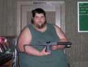 fat-dude-with-uzi1.jpg