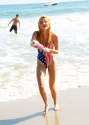 bella-thorne-in-a-swimsuit-at-beach-in-malibu-july-2015_7.jpg