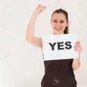 10947413-happy-portrait-young-woman-with-board-yes-Stock-Photo-smile.jpg