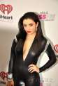 jessie-j-charli-xcx-sexy-jumpsuit-kiss-fm-jingle-ball-chicago-wenn-4__oPt.jpg