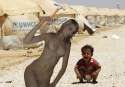 A-Syrian-refugee-child-cries-at-the-Al-Zaatri-refugee-camp-in-the-Jordanian-city-of-Mafraq-near-the-border-with-Syria1.jpg