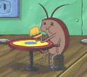 Turkish man eating a hamburger.jpg