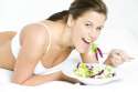 733625_stock-photo-portrait-of-lying-down-woman-eating-salad.jpg