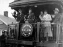Franklin_D._Roosevelt_waves_from_the_rear_platform_of_a_rail_car.jpg