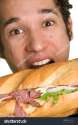 stock man eating sandwich.jpg