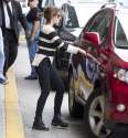 Emma Watson at JFK Airport in NYC_092912_12.jpg