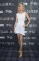 tricia-helfer-at-outlander-panel-at-comic-con-2014-in-san-diego_4.jpg