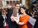 rs_1024x759-160228190141-1024.Olivia-Munn-Aaron-Rodgers-Academy-Awards-Candids-ms.022816.jpg
