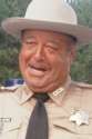 680391-sheriff_buford_t_justice_large_zps8cd9af1f.png