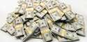GTY_stock_cash_pile_money_dollar_bills-thg-130726_33x16_1600.jpg