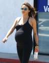 Mila-Kunis-looks-heavily-pregnant-with-huge-baby-bump.jpg