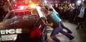 Hundreds-Of-Donald-Trump-Protesters-Surround-And-Destroy-Police-Car-At-Costa-Mesa_-California-Rally.jpg