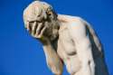 Ashamed-head-in-hands-statue.jpg