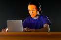 2505733-hacker-sitting-in-dark-room.jpg