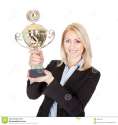 businesswoman-winning-trophy-23081360.jpg