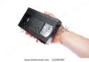 stock-photo-in-the-hand-of-a-man-old-videotape-format-vhs-134995397.jpg
