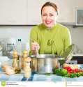 female-cooking-healthy-soup-beautiful-stirs-pan-ladle-meal-kitchen-50540668.jpg