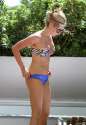 celebrity_paradise.com_TheElder_AshleyTisdale2011_10_21_poolsideinMiami27.jpg