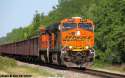 bnsf_6327_and_bnsf_9265_lead_taconite_ore_train_by_eternalflame1891-d5av2zx.jpg