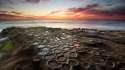 holes-in-beach-next-to-ocean-7680x4320.jpg