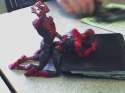spiderman fucking spiderman on a wallet.jpg