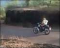 MotorcycleMeetsTruck.gif