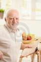 portrait-senior-man-breakfast-16987014.jpg