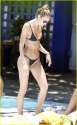 candice-swanepoel-poolside-bikini-babe -with-hermann-nicoli-01.jpg