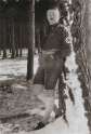 Hitler looking faintly ridiculous in lederhosen & long socks.jpg