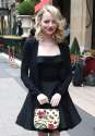 Emma-Stone-Wears-Sexy-Fuschia-Pumps-for-Paris-Fashion-Week.jpg