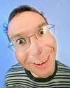 7259640-Funny-surprised-man-in-glasses-portrait-on-vivid-color-background-Stock-Photo.jpg
