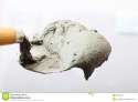 close-up-bucket-trowel-cement-mortar-home-improvement-renovation-construction-site-33899812.jpg