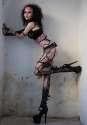 cyberpunk-alternative-adult-model-razor-candi-in-fishnet-teasing-open-the-silky-edges-of-porn.jpg